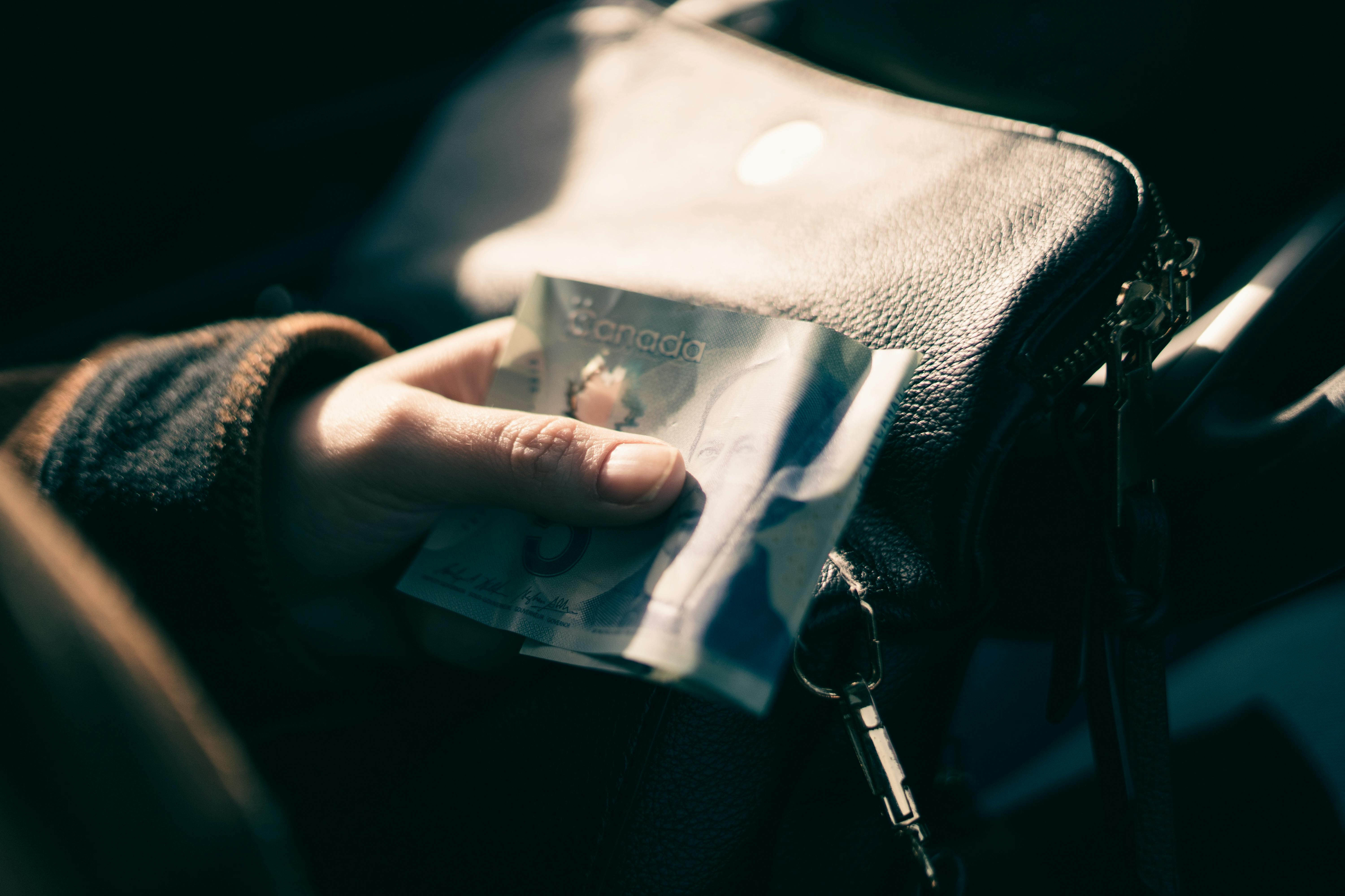 A Person Holding Money